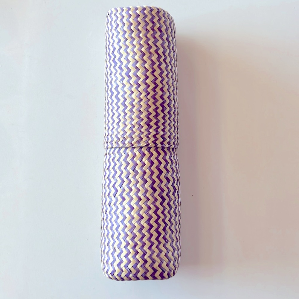 Handmade purple wicker bottle cover. Great for gifts and gift wrapping.